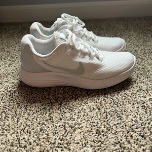 NIKE shoes size 6.5. Lightly used, only worn a couple times because too small!